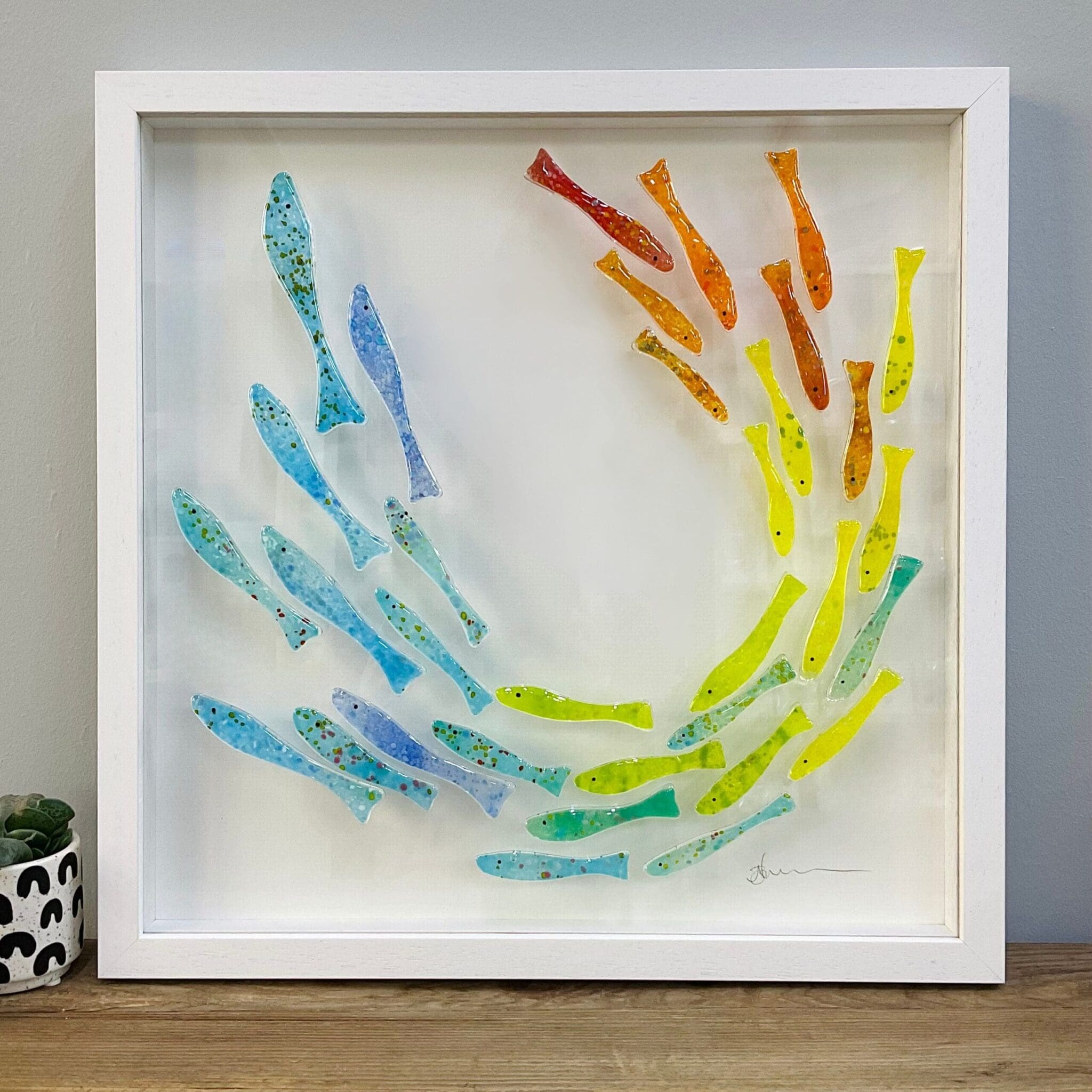 colourful rainbow framed fused glass fish