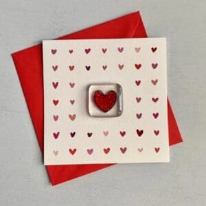 mini red hearts greetings card with fused glass token