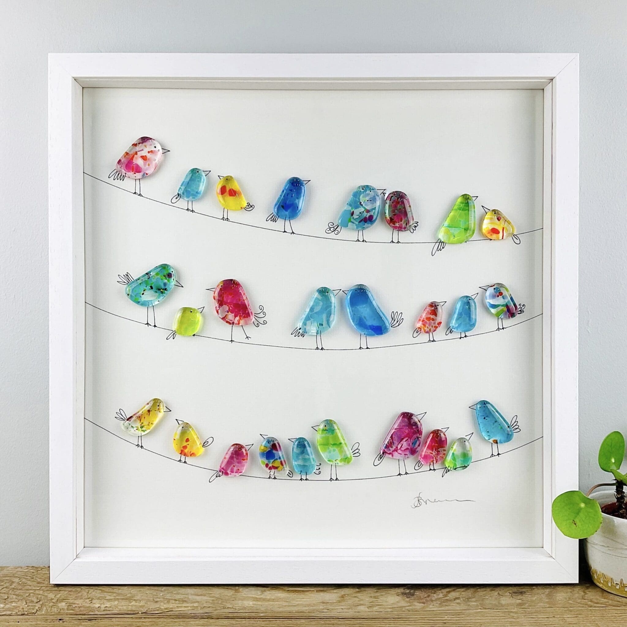 Framed fused glass birds on lines picture